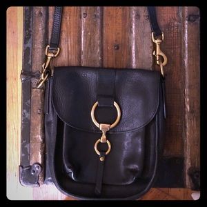 Frye black crossbody with brass detail